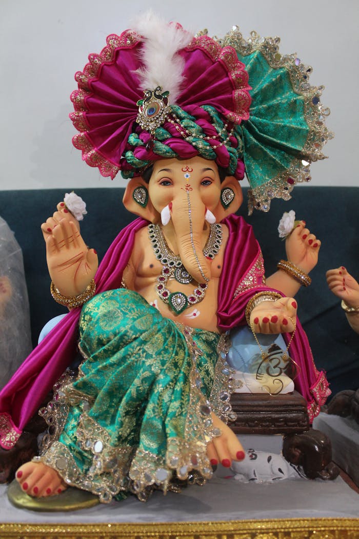 Colorful Lord Ganesha statue with intricate detailing, ideal for festival decorations.